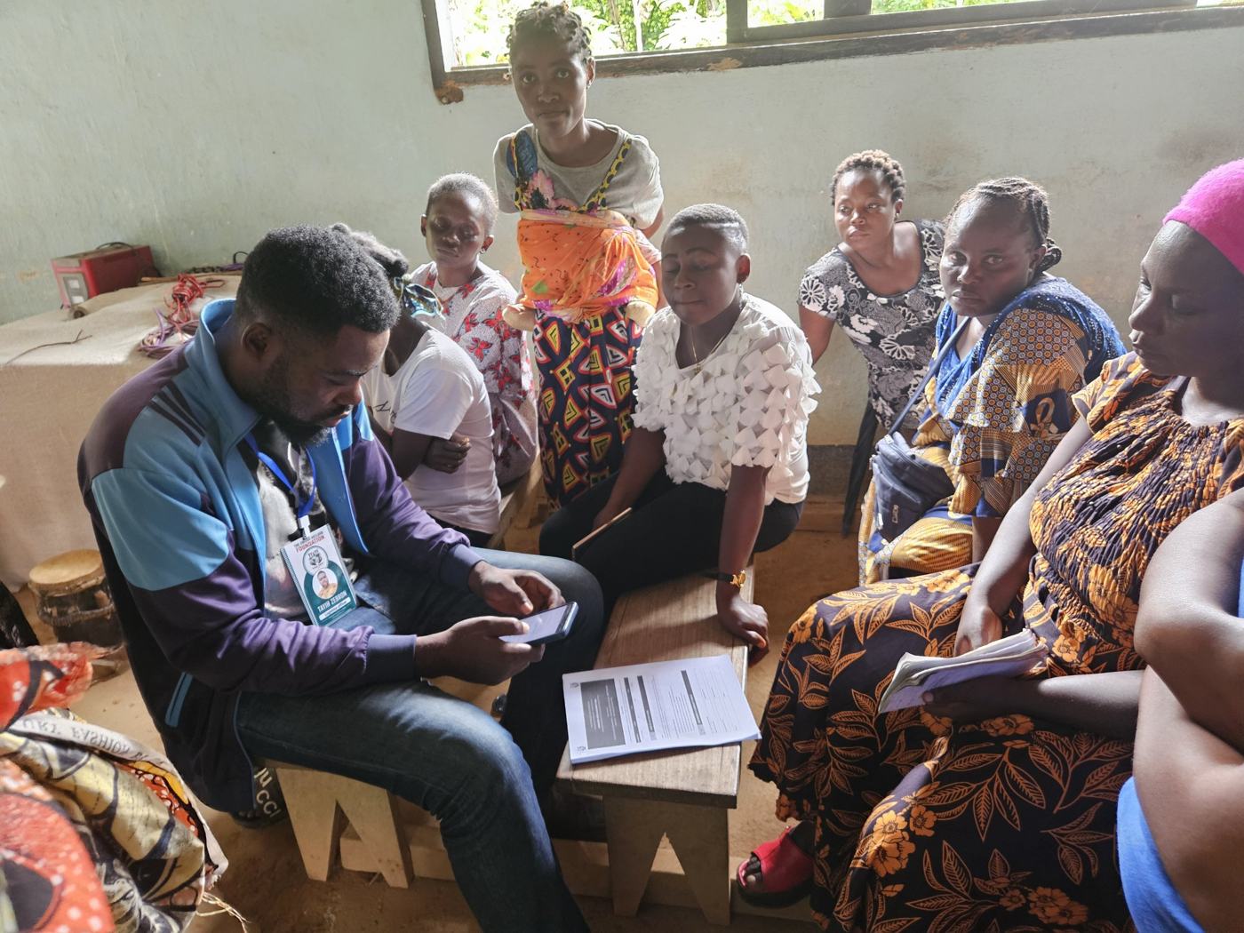 OKF field officer recording community assessment responses